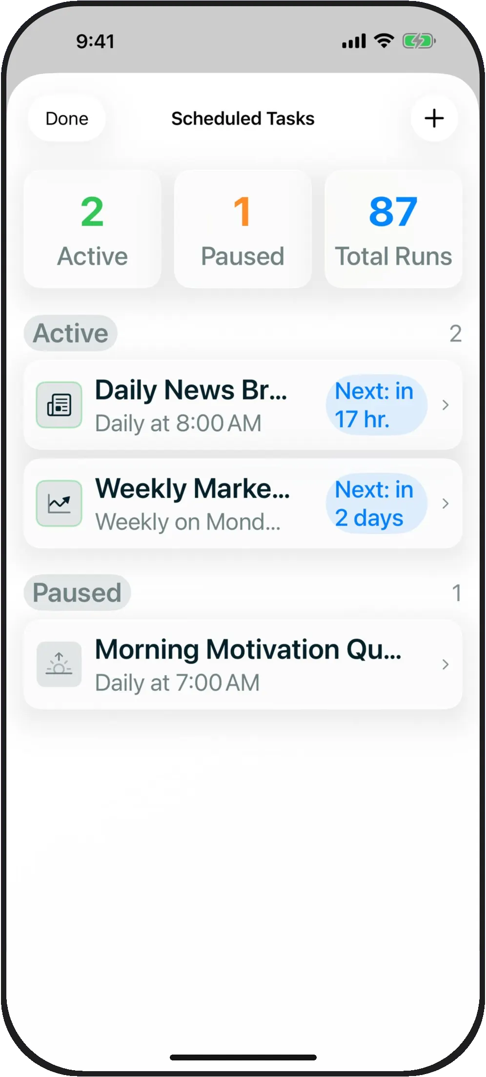 The Scheduled Tasks screen: 2 active, 1 paused, 87 total runs. Daily News Brief at 8:00 AM, next run in 17 hours.
